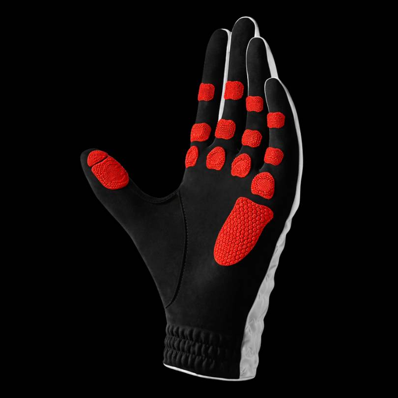 EXO Golf Glove red colorway product render showing Zyntech nanocell grip zones across palm and fingers on black background