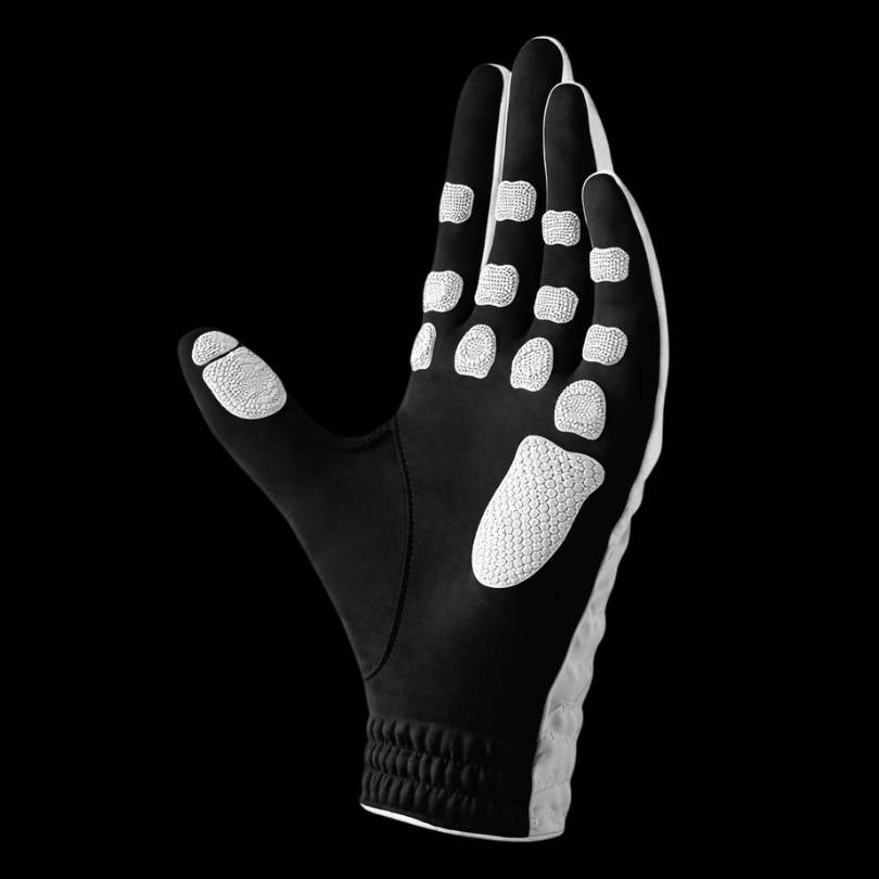 EXO Golf Glove white colorway product render showing Zyntech nanocell grip zones across palm and fingers on black background