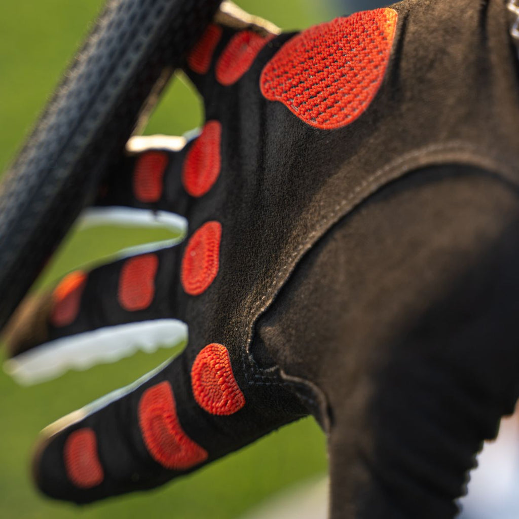 EXO Golf Glove with red nanocells - palm spread open about to grip a club