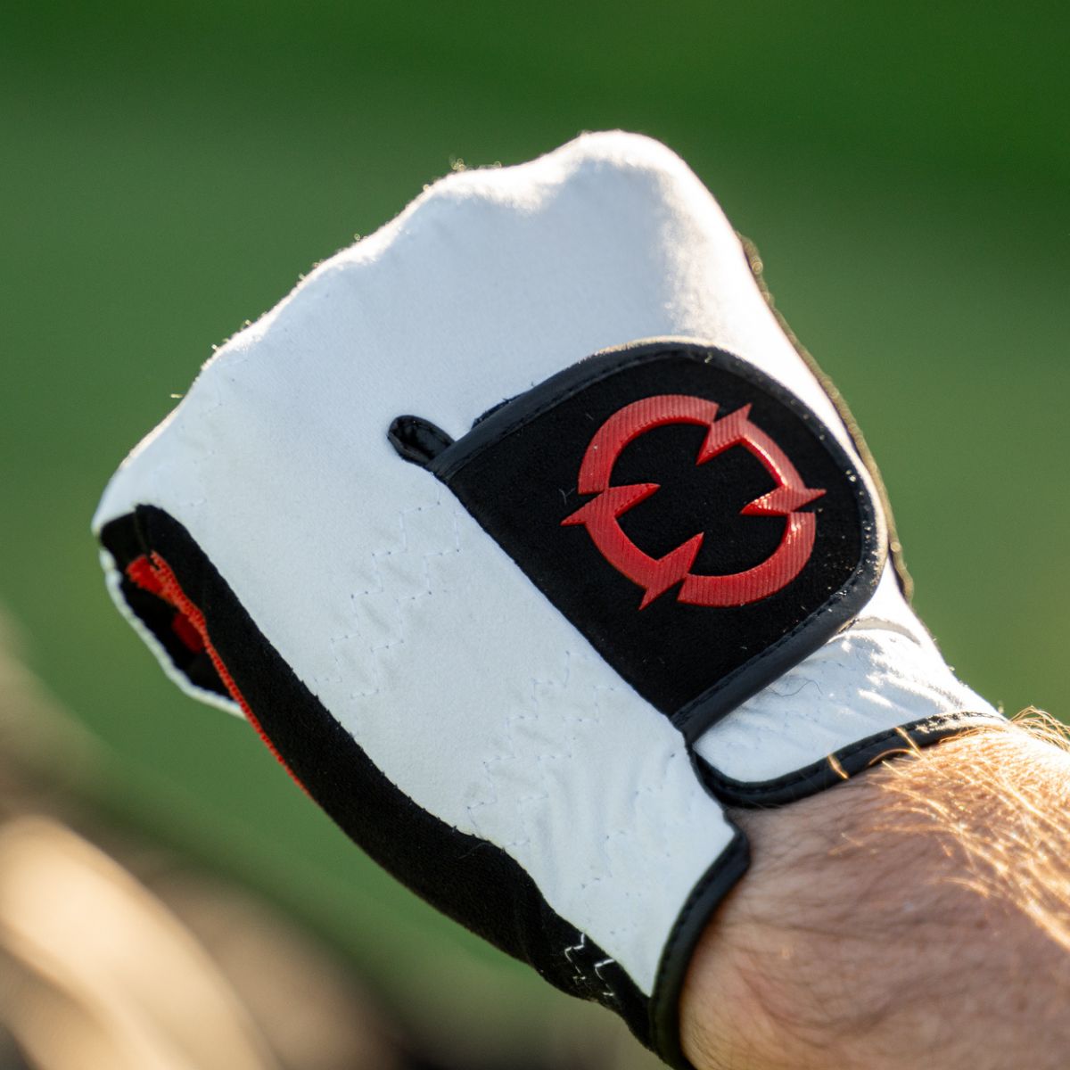 EXO Golf Glove with reg logo forming a fist